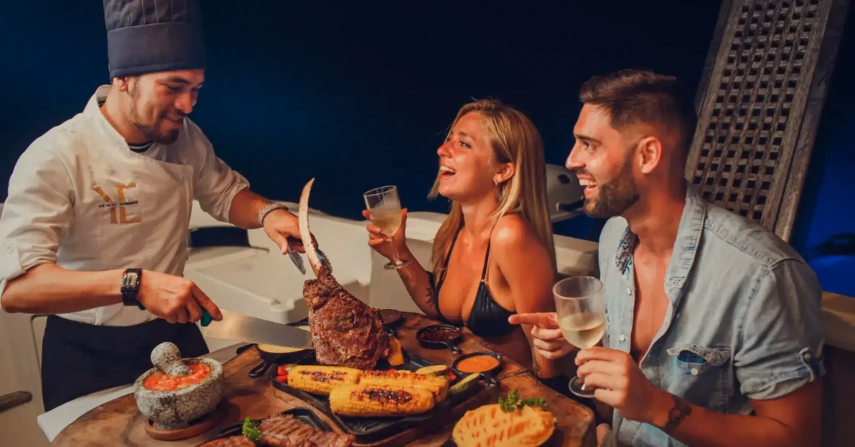 chef preparing food on a boat near tulum