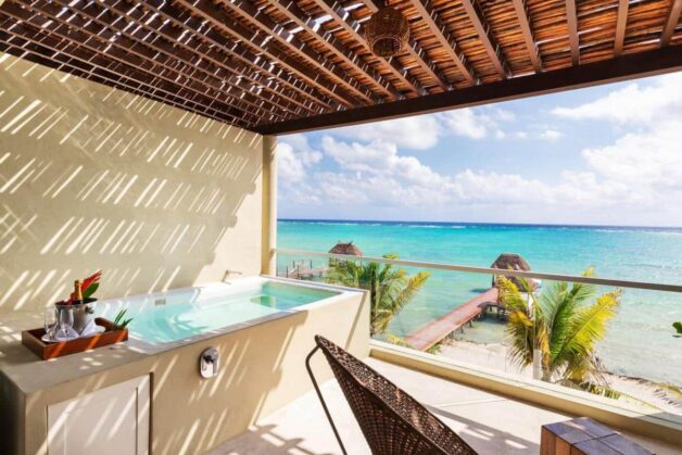 best hotels in tulum - seaview with palm trees