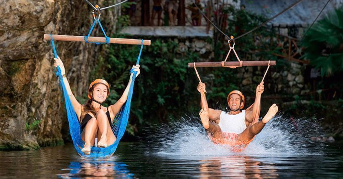 couple at a waterslide at xplor